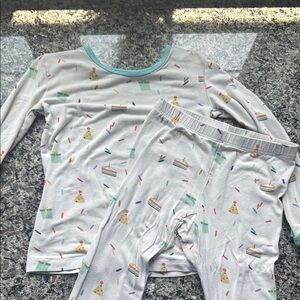 Kyte BABY White and Blue Pajama Sets with Playful Dinosaur Print